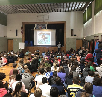 students attending an assembly